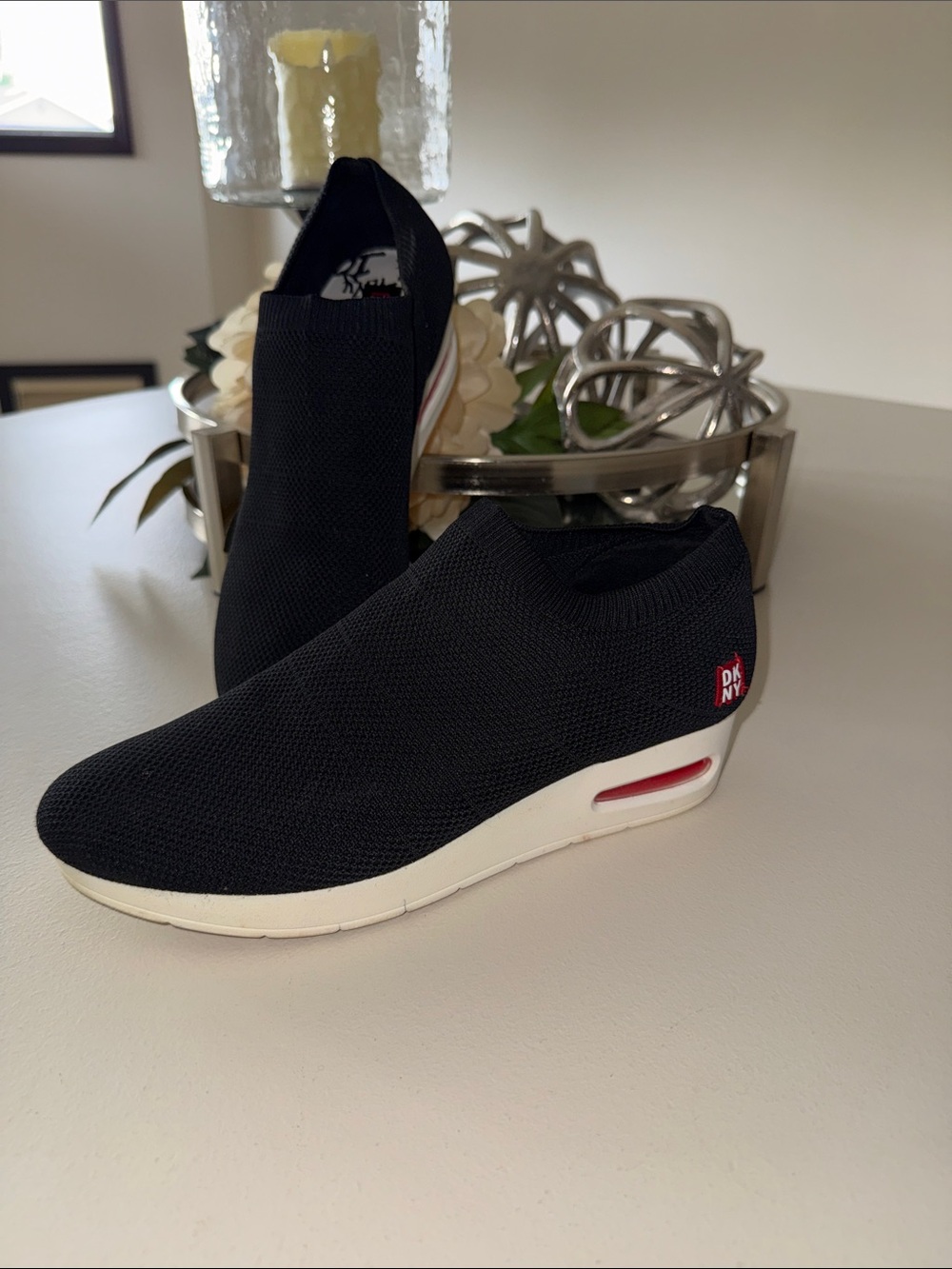 DKNY Black Knit Slip-On Wedge Sneakers with White Sole and Red Accent